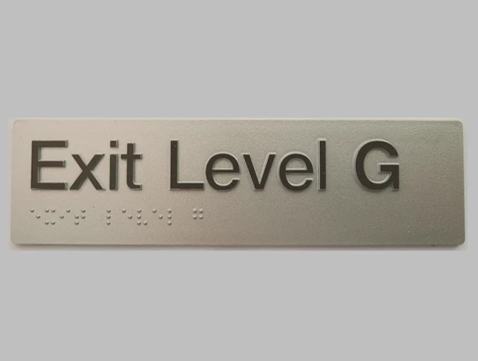 AS1428 Compliant Exit Sign Level G SILVER Ground Level Braille 180x50x3mm
